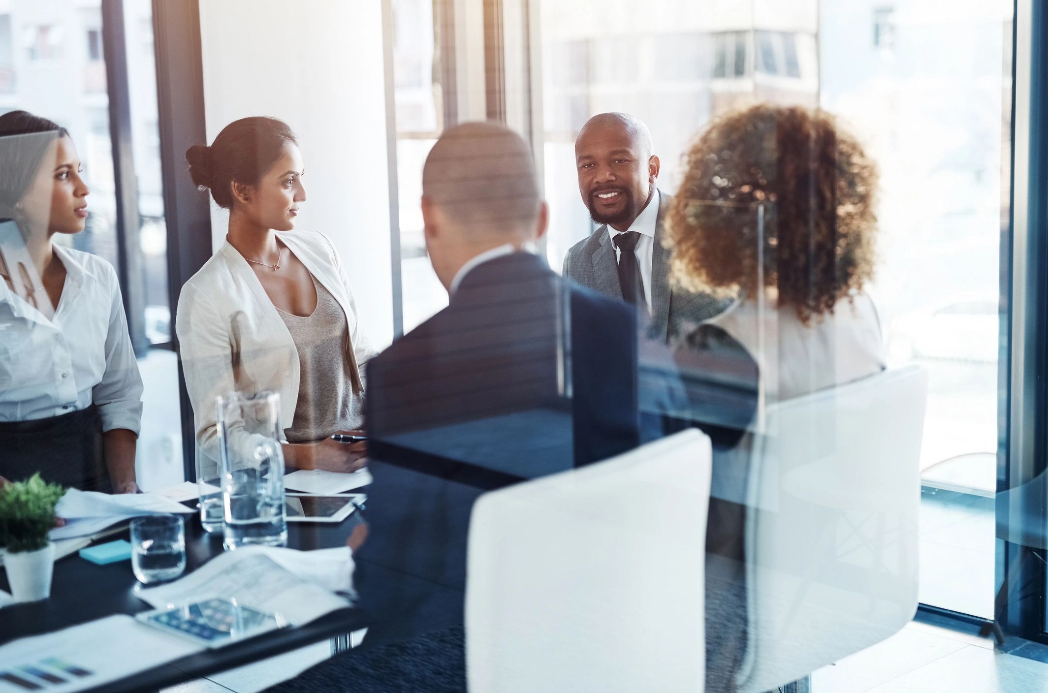 Professionals collaborating in a boardroom